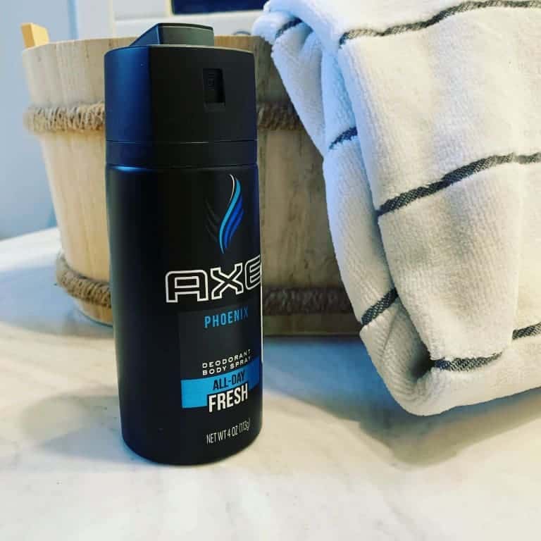 a bottle of axe phoenix body spray