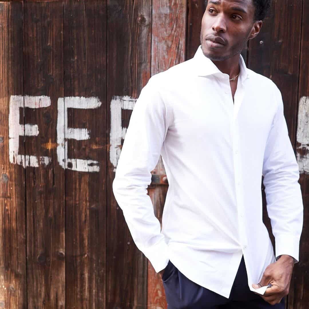 man wearing a white dress shirt by neem london