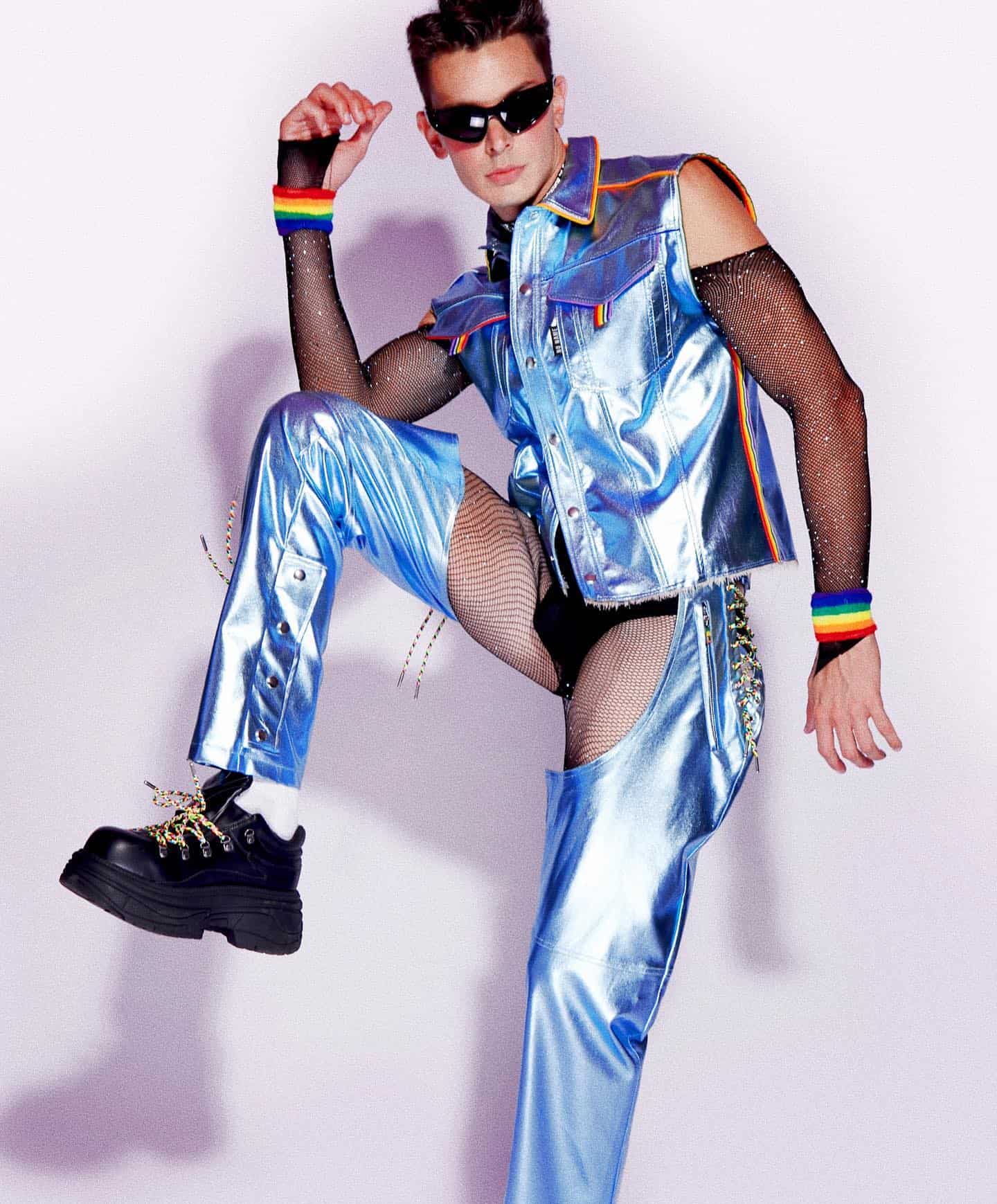 Disco fashion: man with sunglasses wearing a metallic blue outfit