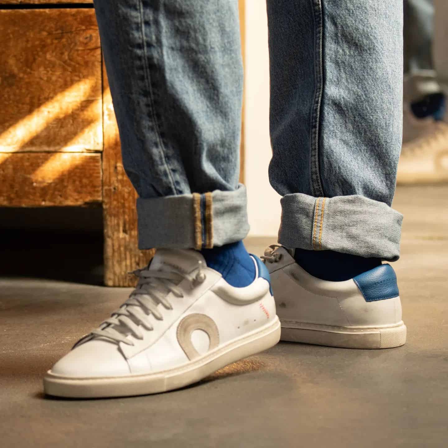 a pair of blue on white low 1 by oliver cabell