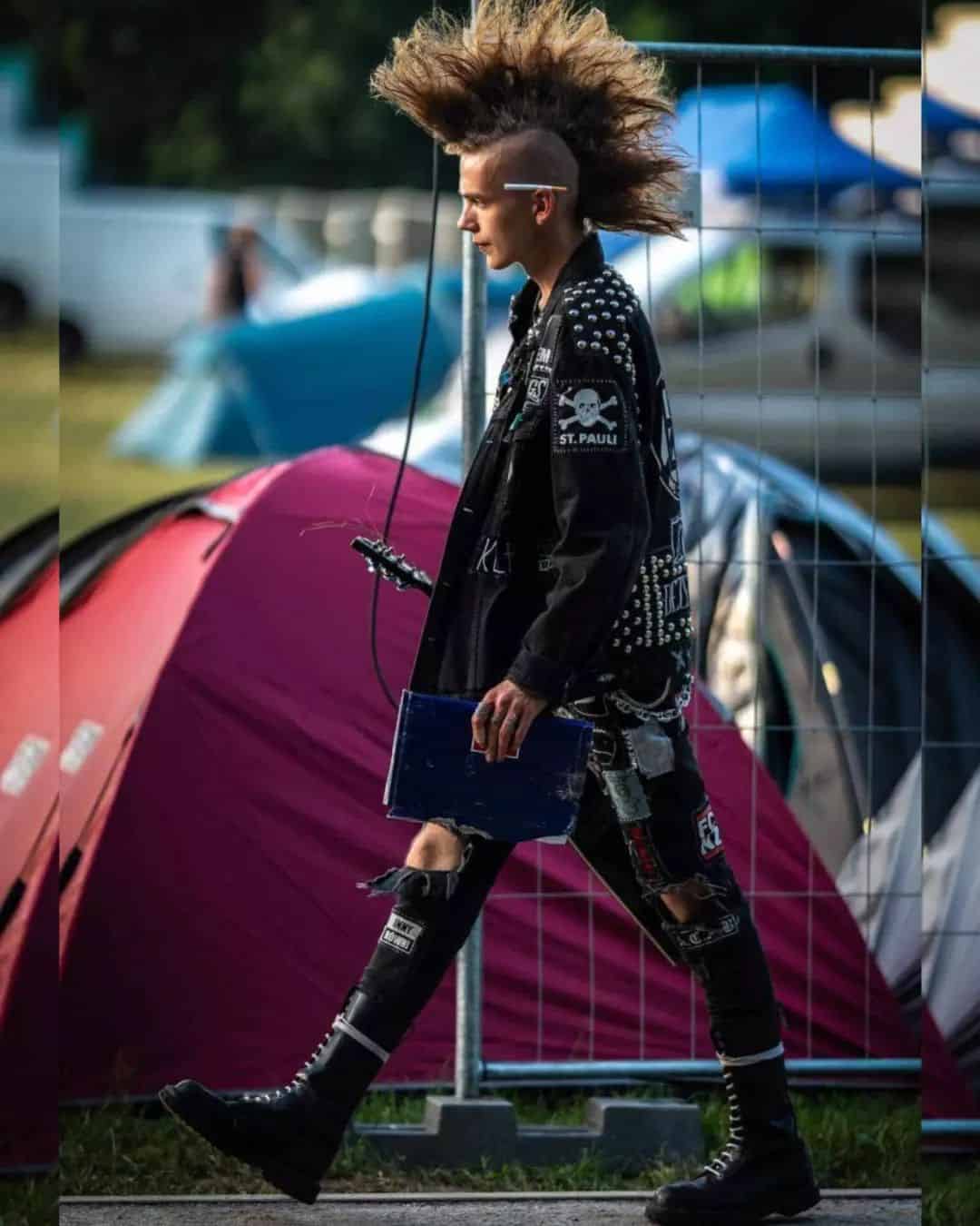 man with a spiky mohawk hairstyle