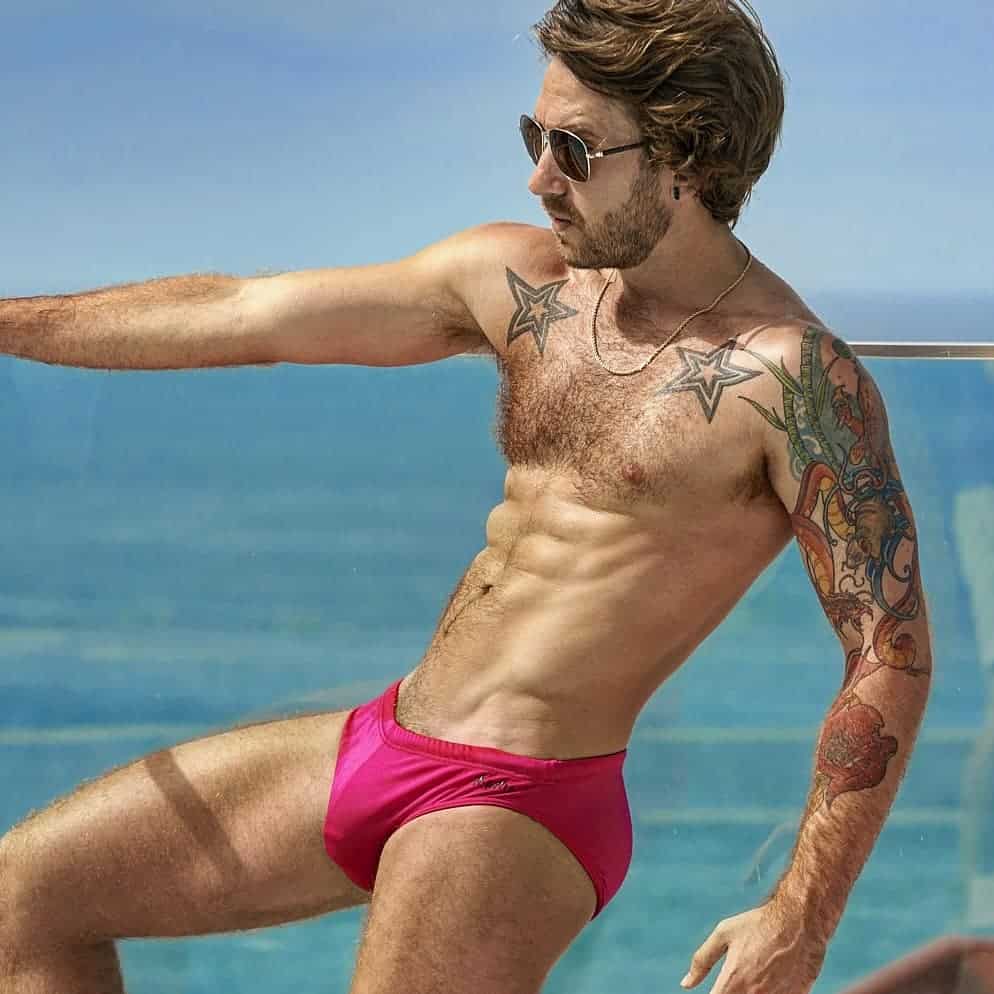 man wearing a pink bikini underwear