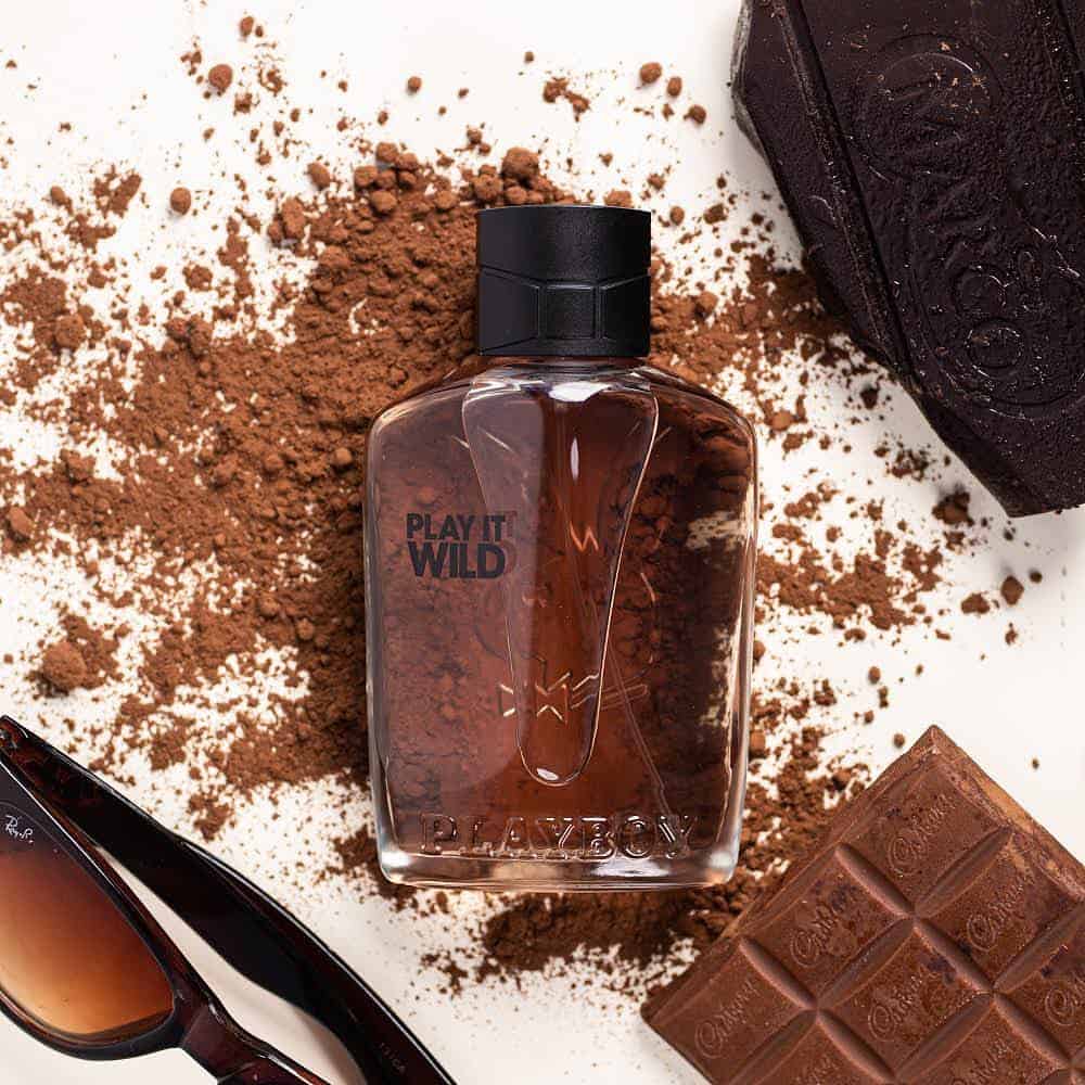 a bottle of play it wild cologne by playboy