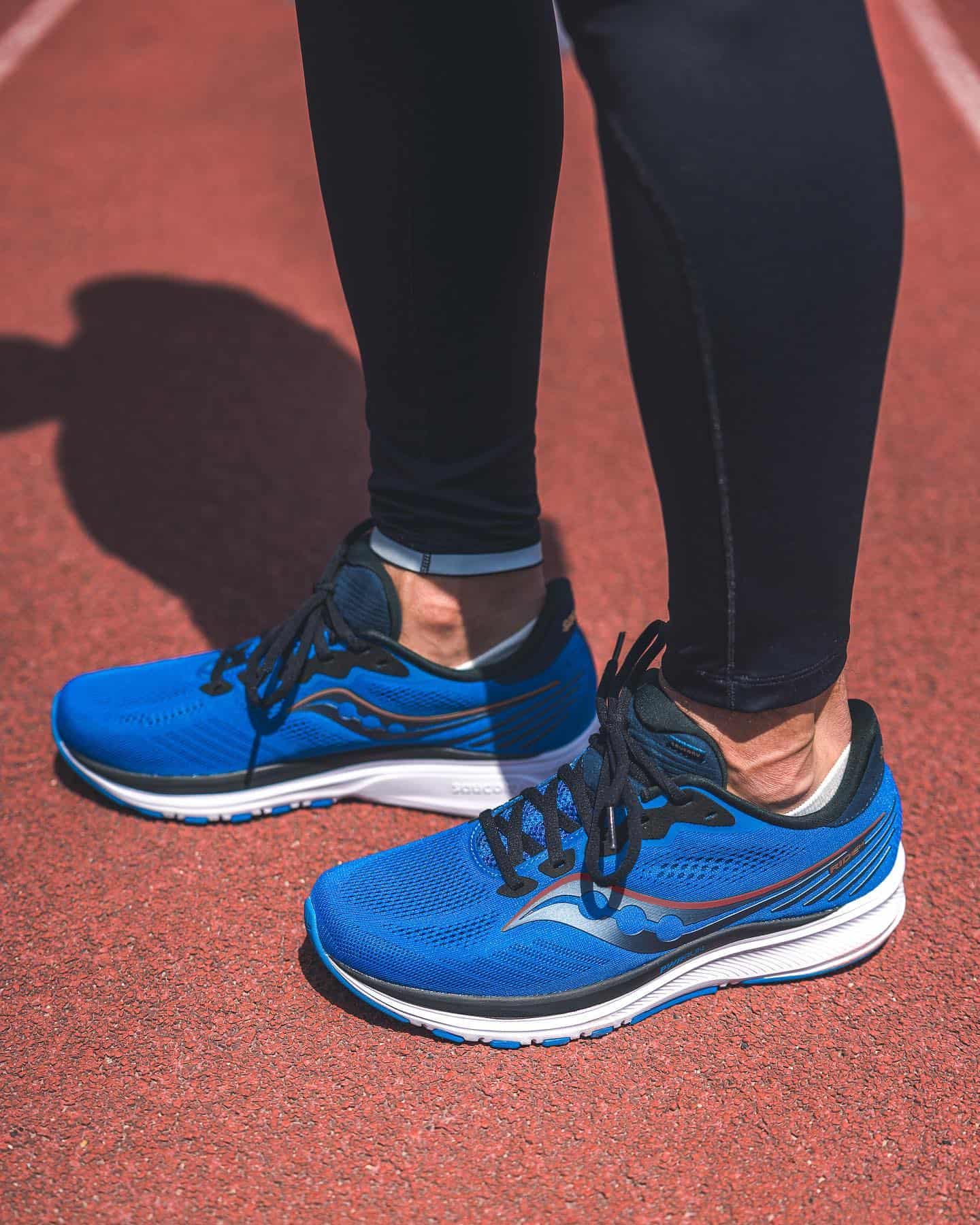 wearing a saucony no-show socks for running shoes
