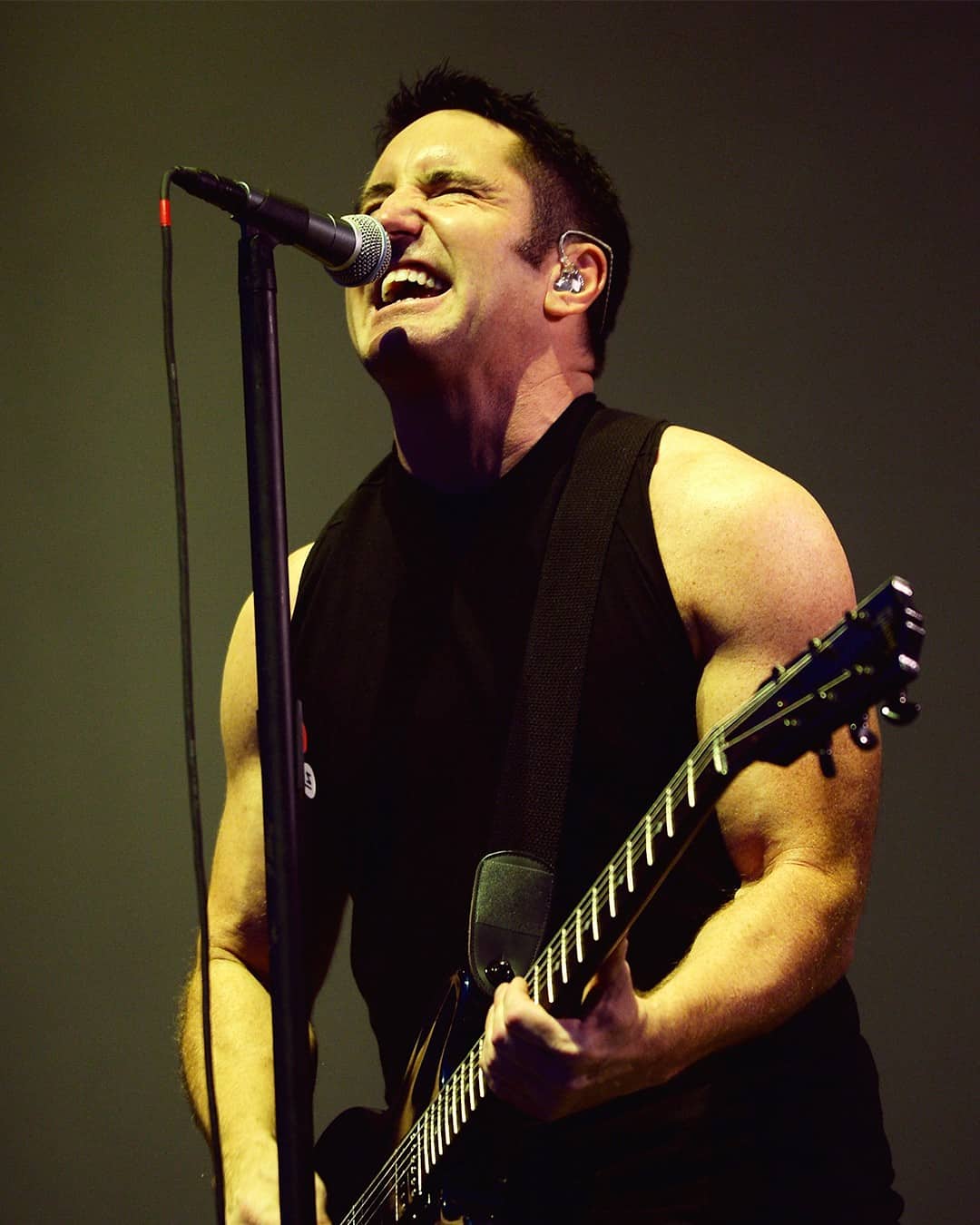 trent reznor singing onstage