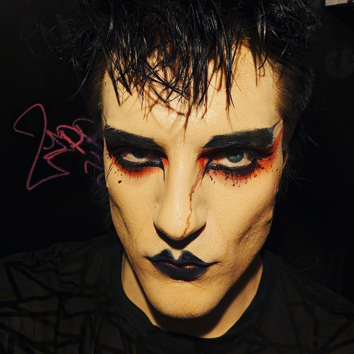 Gothic fashion: man with goth style grooming