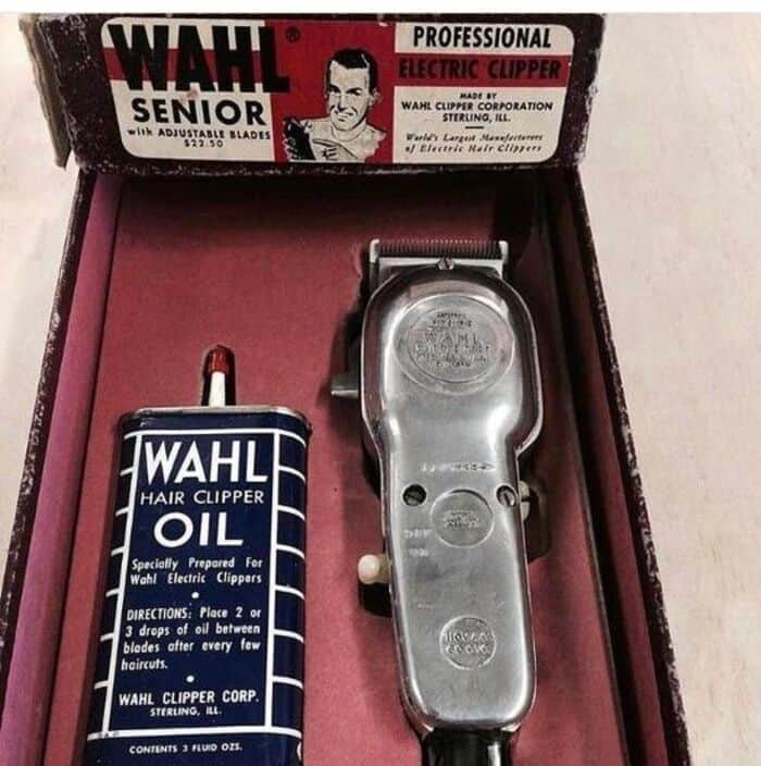 an old wahl hair clipper and a can of clipper oil