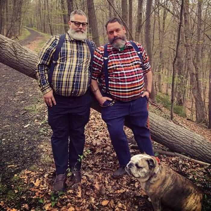 two fat men in plaid shirts with suspenders