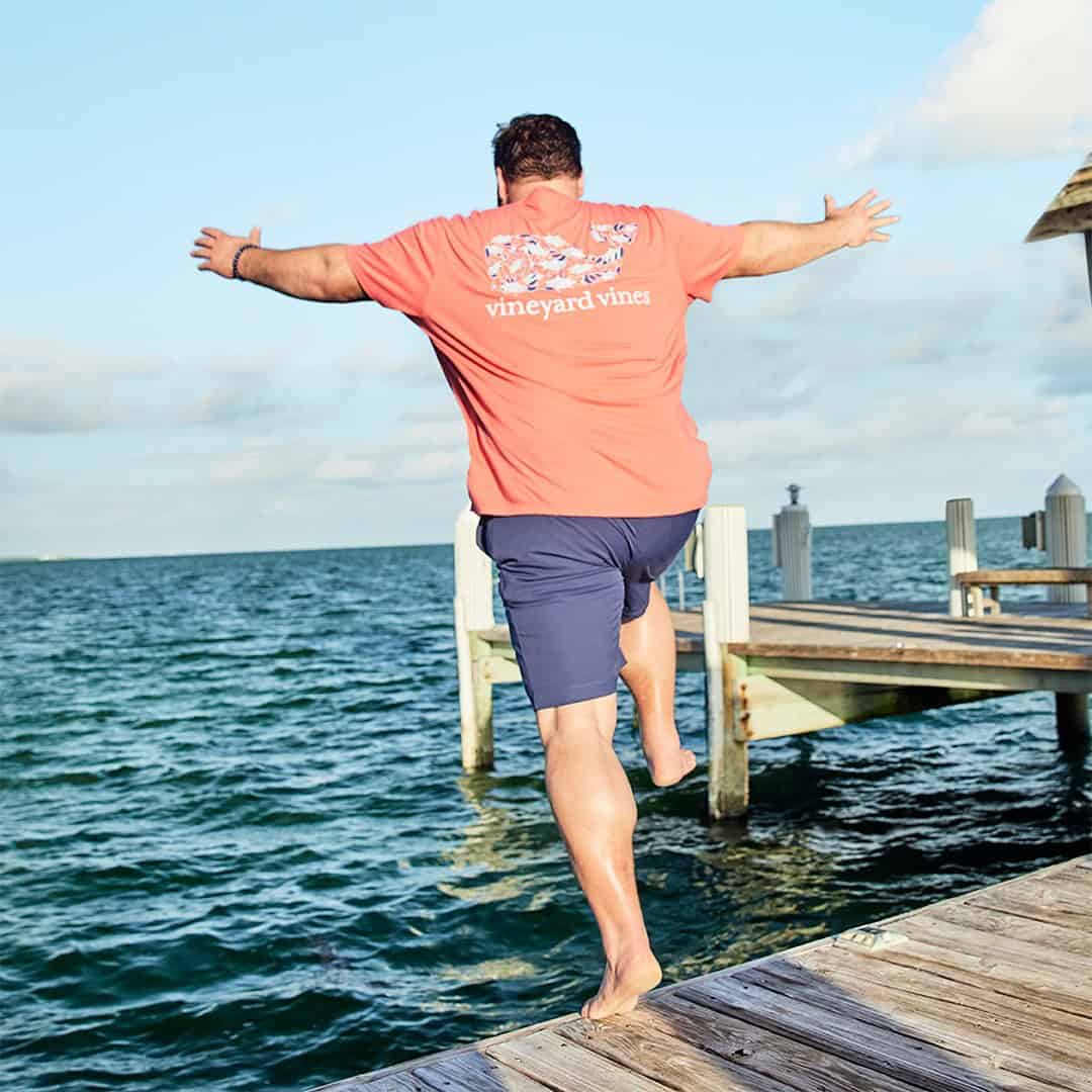 man jumping into the sea