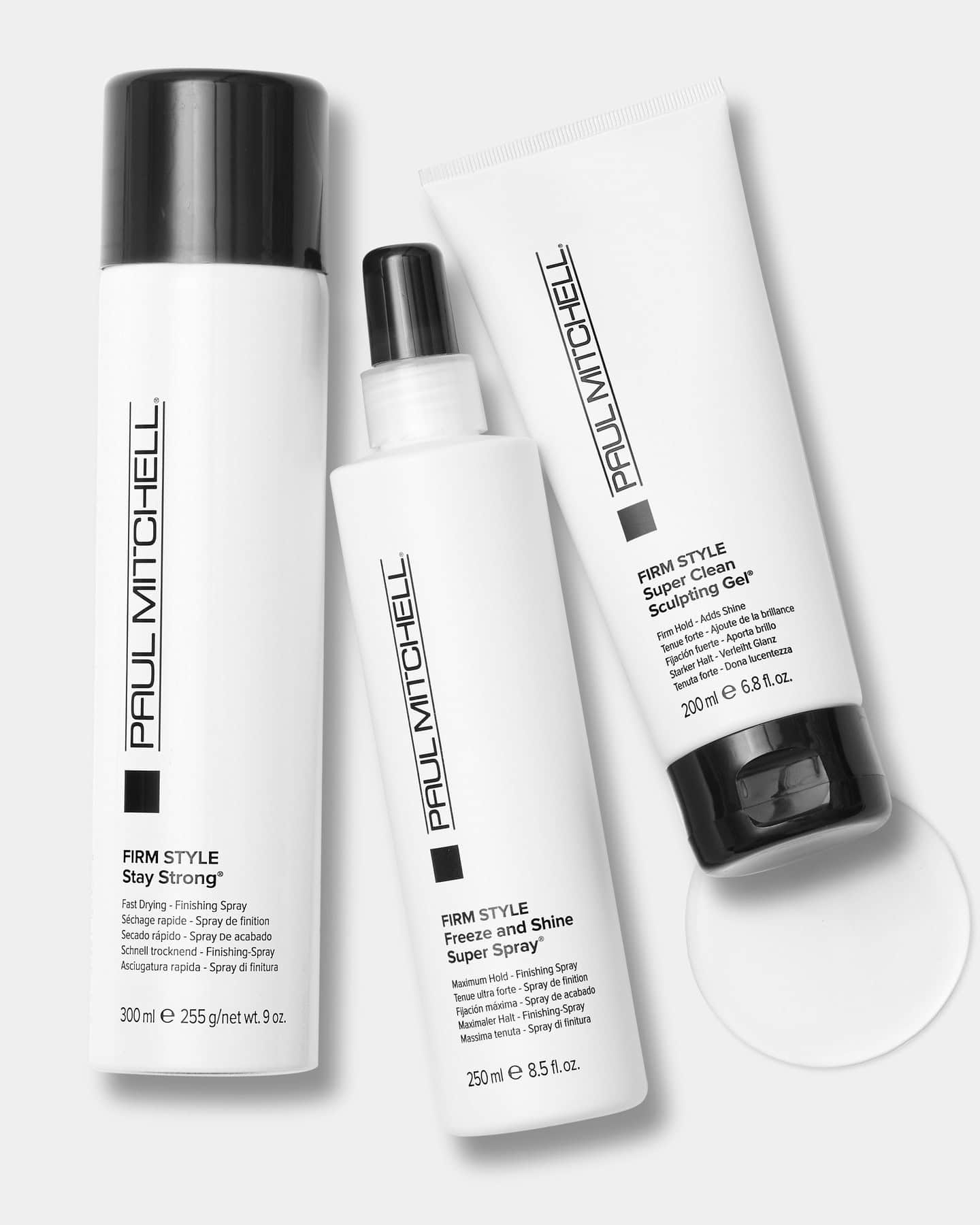 bottles of firm style hair grooming products by paul mitchell