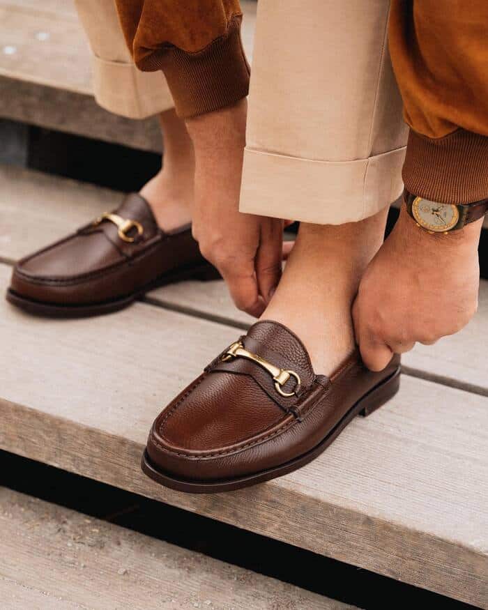 wearing a pair of college loafers by velasca