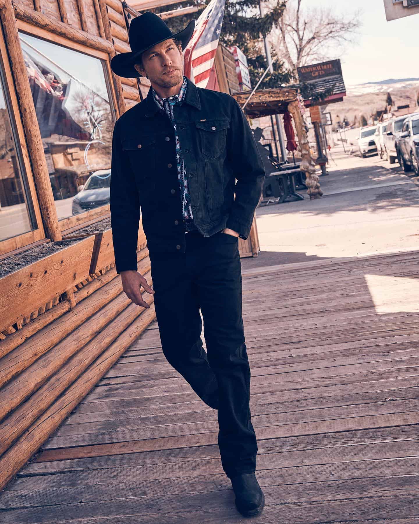 wearing black denim jacket and jeans