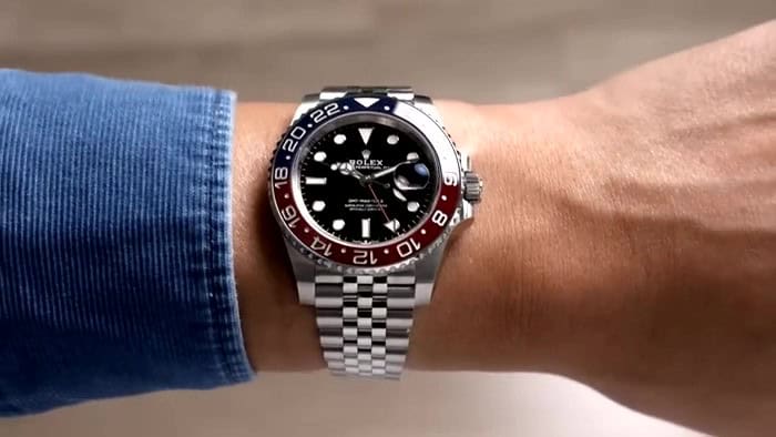 wearing a rolex GMT master II