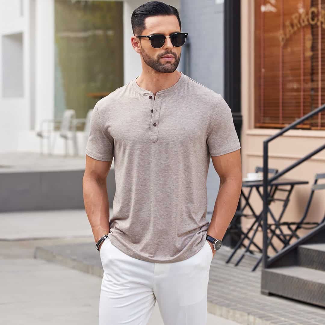 man with sunglasses wearing a brown henley t-shirt
