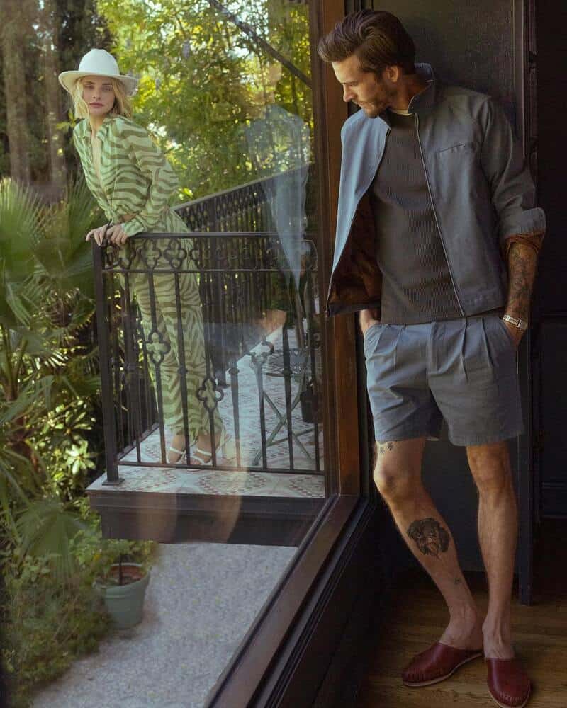 man wearing the rhodes twill jacket and pleated shorts