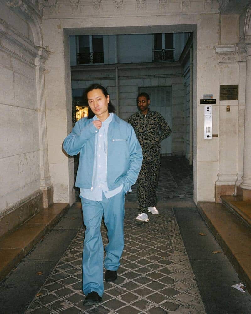 man in a matching light blue jacket and pants