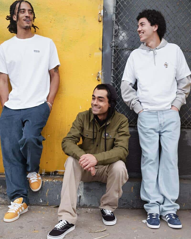 three men having a conversation