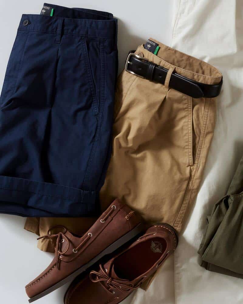 a blue and brown shorts and a pair of loafers by dockers