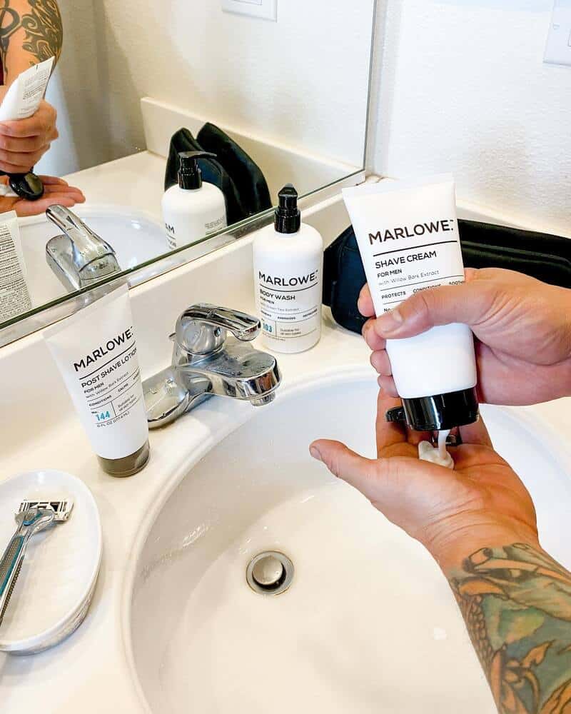 squeezing a nickle size amount of marlowe shave cream