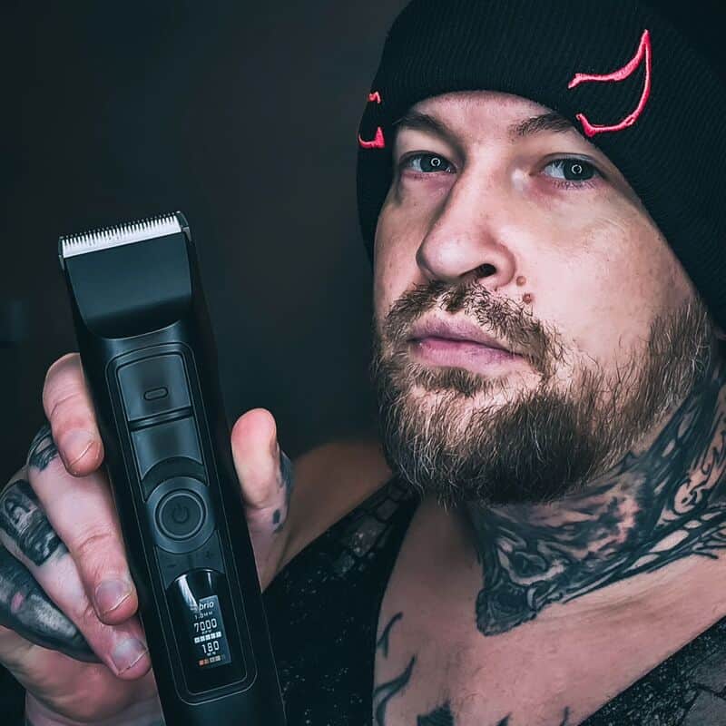 man holding the brio beardscape trimmer