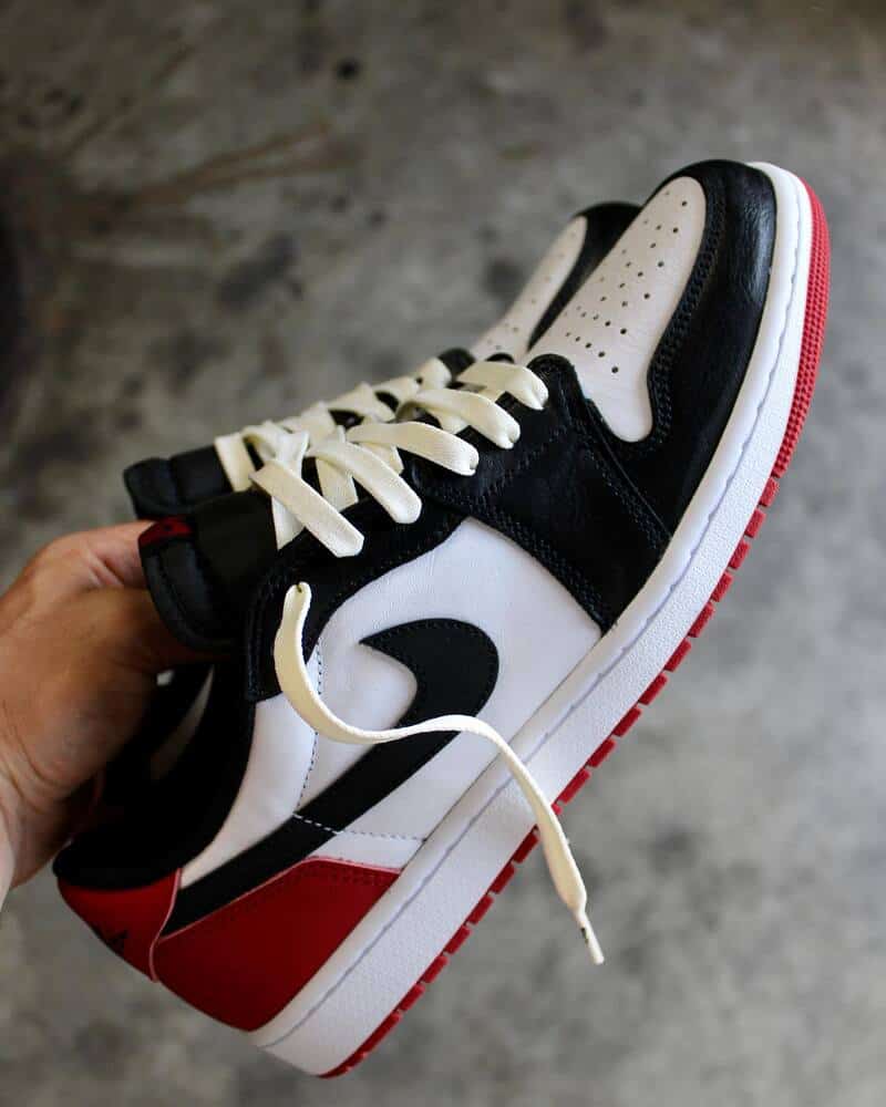 putting on new laces for a retro low air jordans