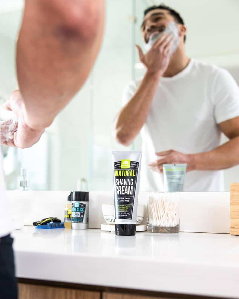 man using the natural shaving cream from pacific shaving company
