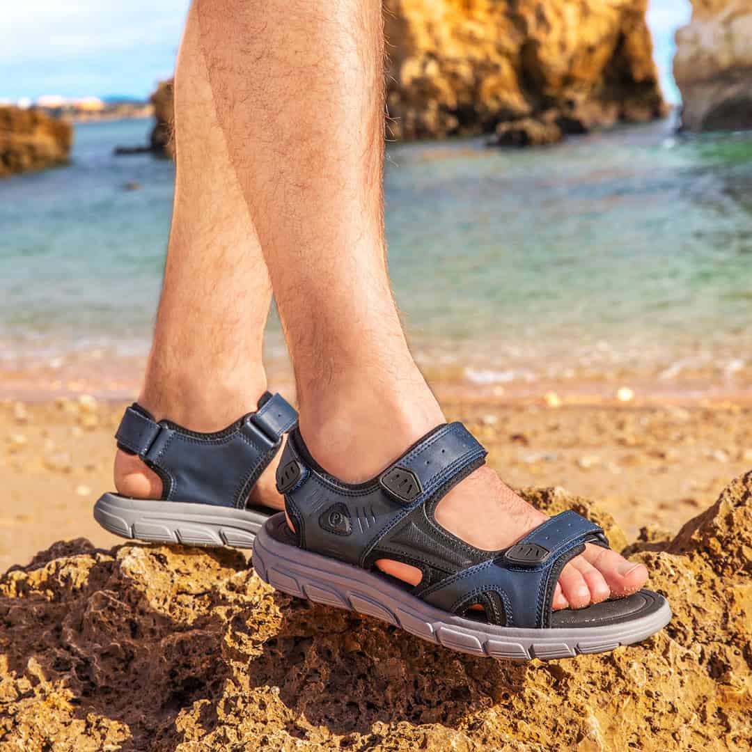 wearing a pair of pavers adjustable sandals