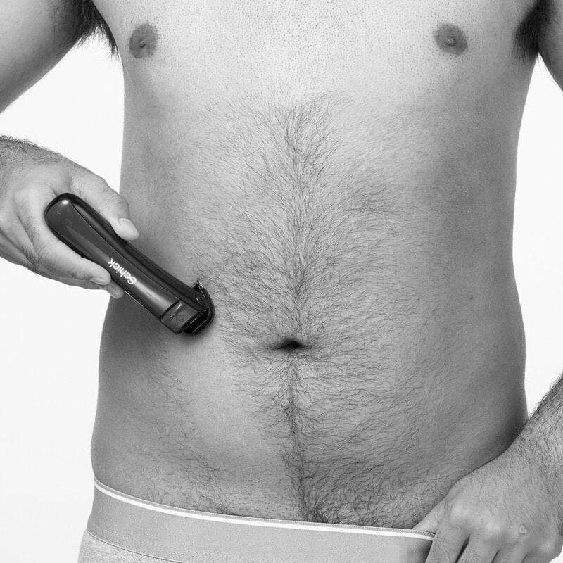 man trimmer hair on theabdomenarea