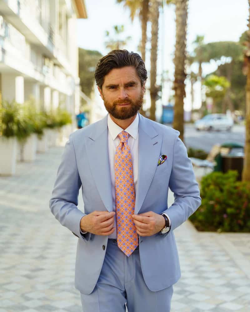 man wearing a light blue suit