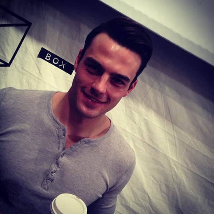 man wearing a henley t-shirt