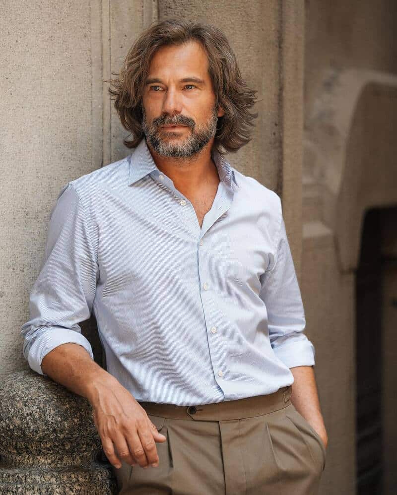 man wearing a striped shirt by velasca
