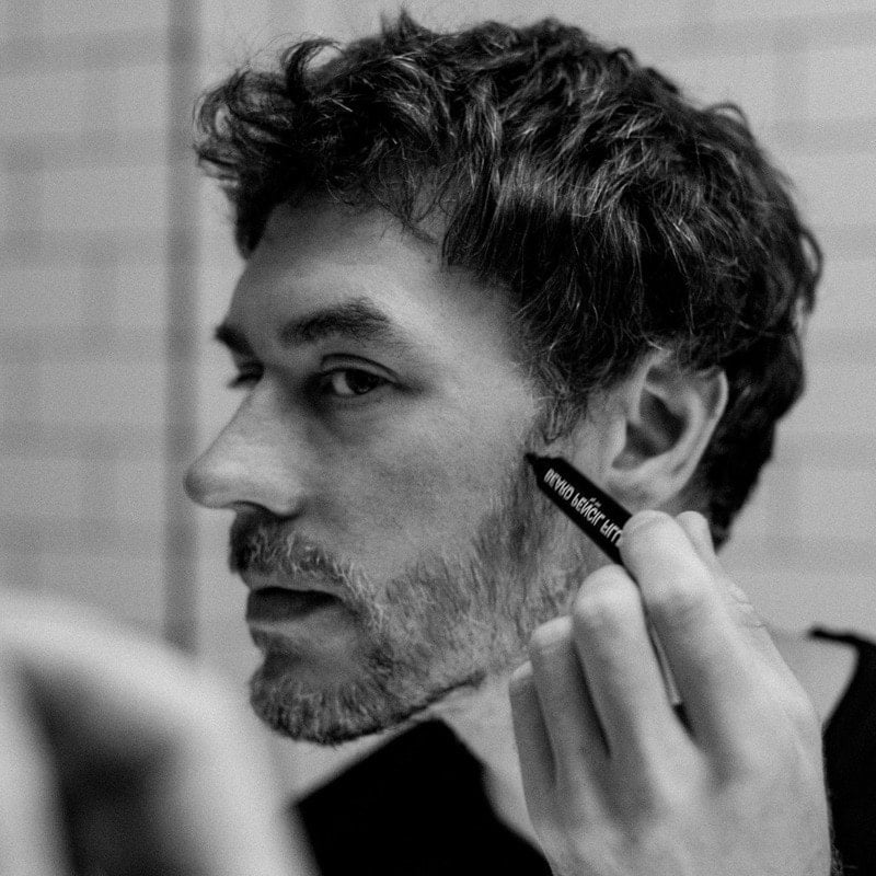 man using the beard pencil filler