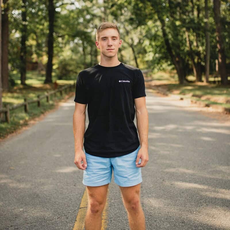 man standing in the middle of the road