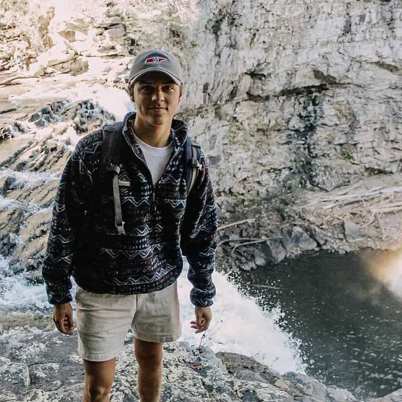 man standing on a sea cliff