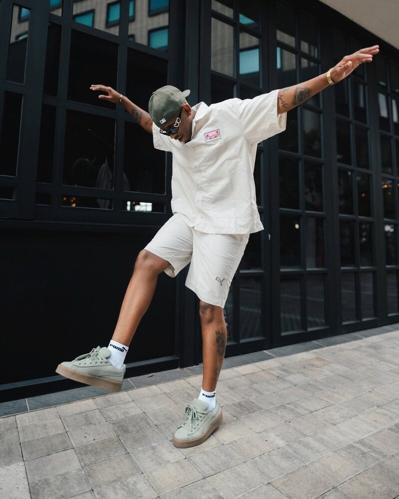 man enjoying his puma sneakers