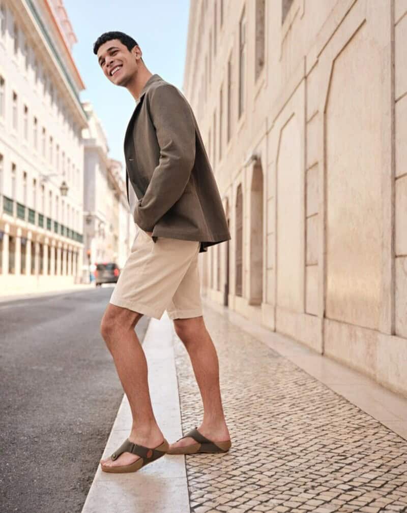man wearing the FitFlop Track II Thong Sandals