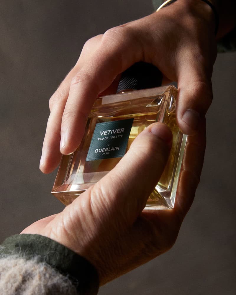 passing a bottle of Vetiver Eau De Toilette by Guerlain