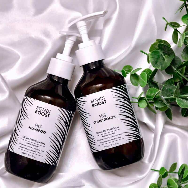 bottles of Bondi Boost HG Shampoo and Conditioner