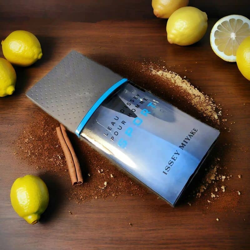 a bottle of L'eau D'issey Pour Homme Sport Cologne surrounded by lemons