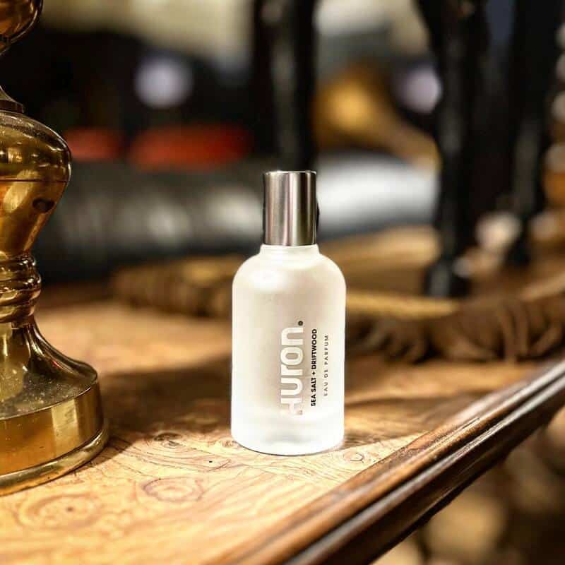 a bottle of Sea Salth and Driftwood Eau de Parfum by Huron