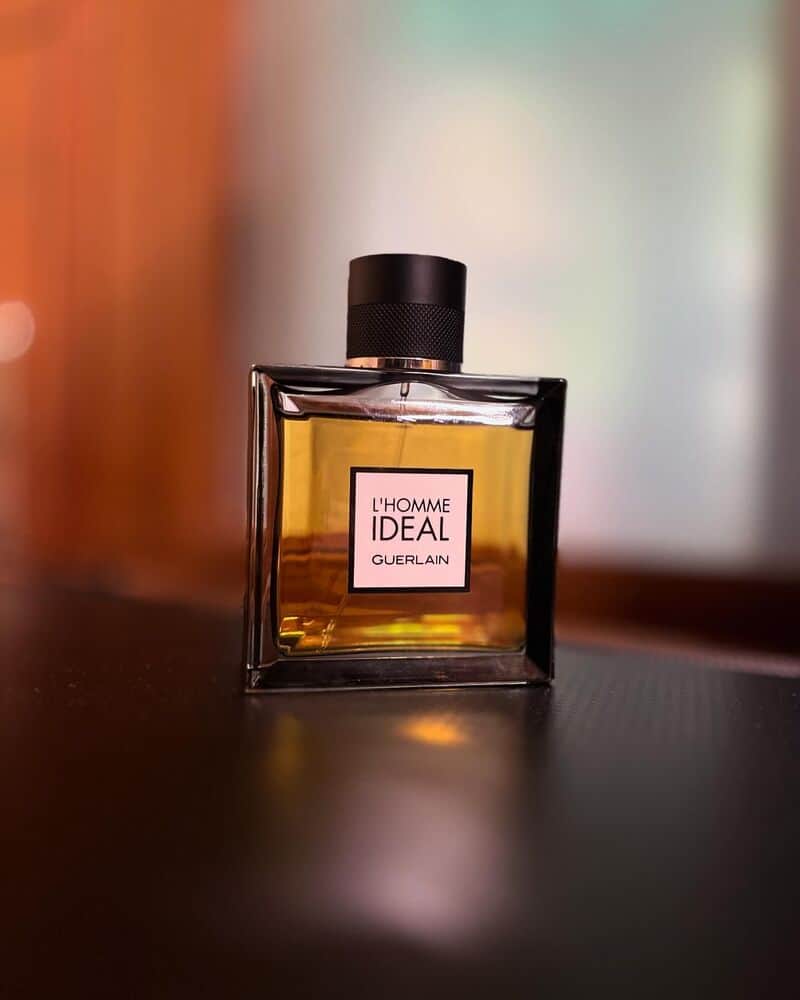 a bottle of Guerlain L'Homme Ideal Cologne