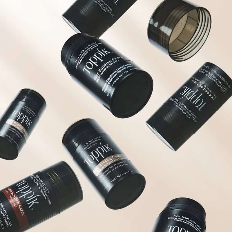bottles of Toppik Hair Building Fibers