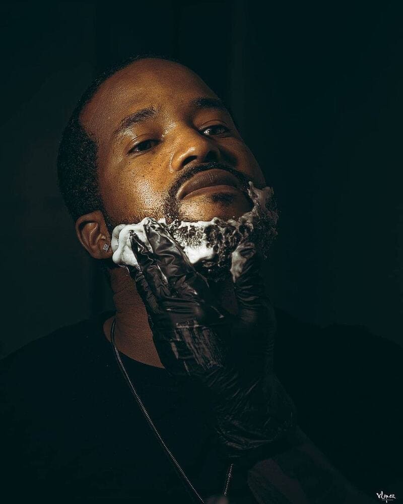 man applying a foam beard dye by TrueSons