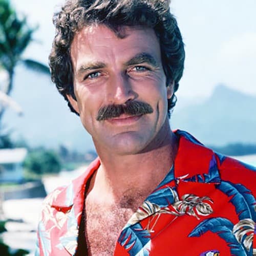 Tom Selleck wearing a red hawaian shirt