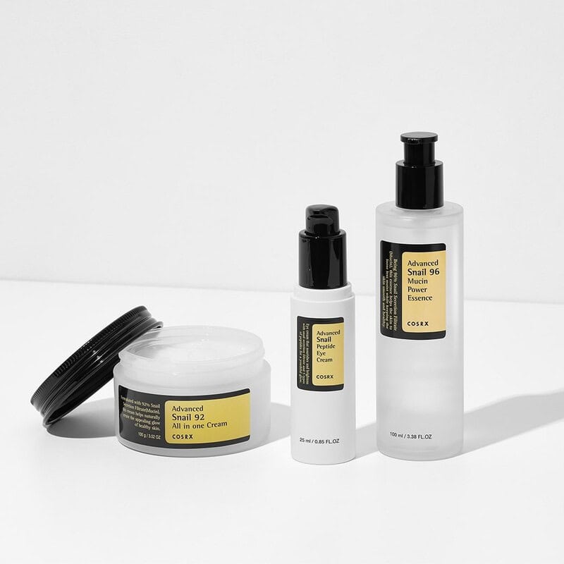 a collection of COSRX Advance Snail skincare products
