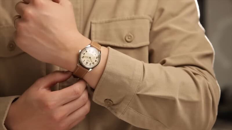 wearing the Kuoe Old Smith Field Watch