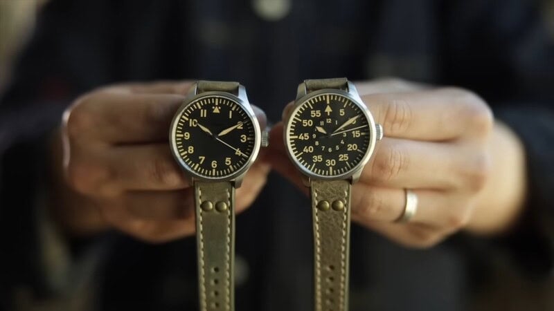 holding two different kinds of Laco Pilot Watch