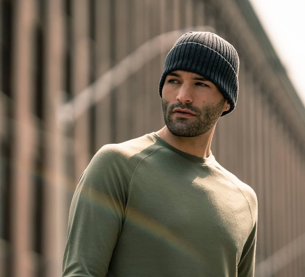 man wearing a sweater and ribbed beanie