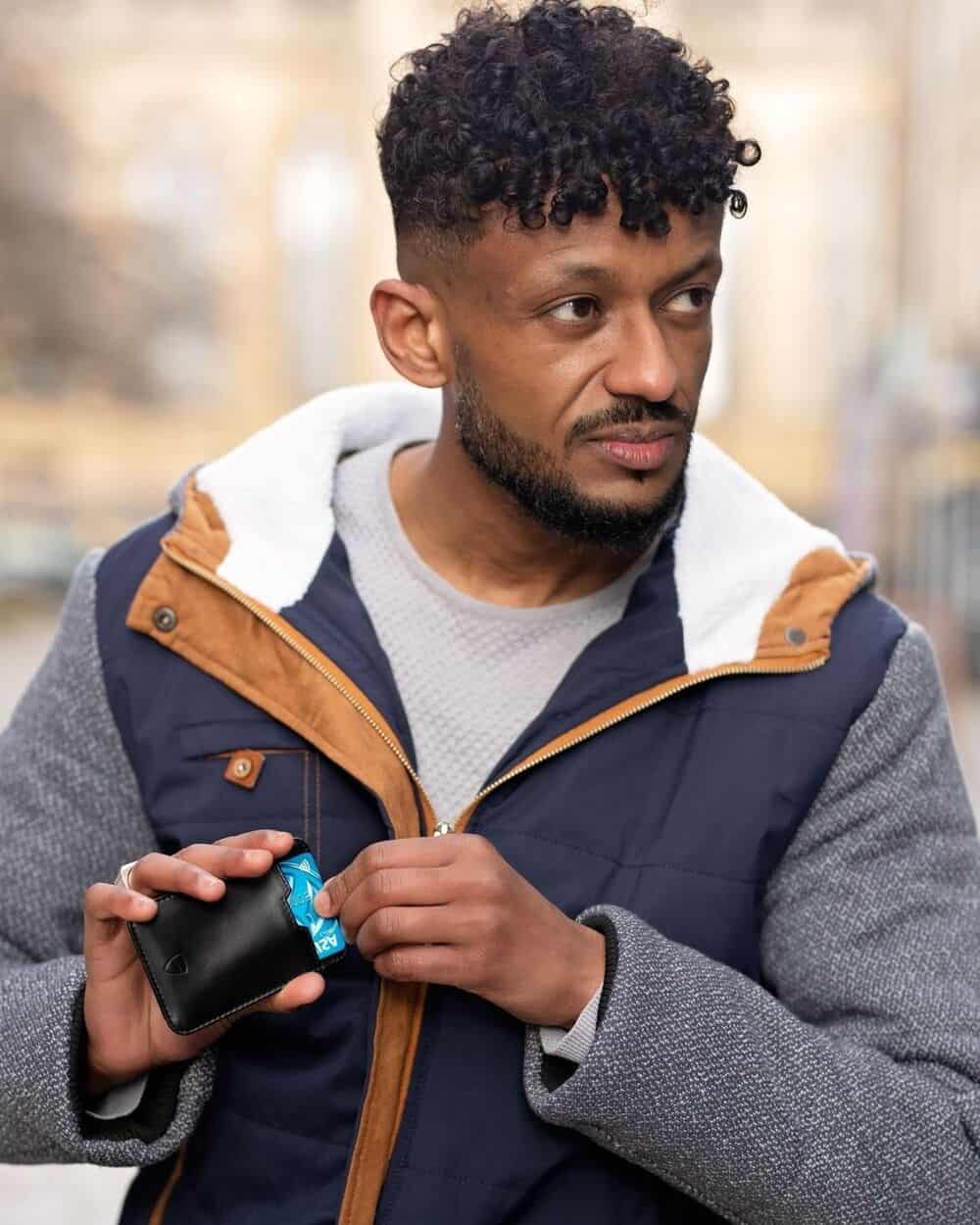 man holding the Chelsea RFID Cardholder