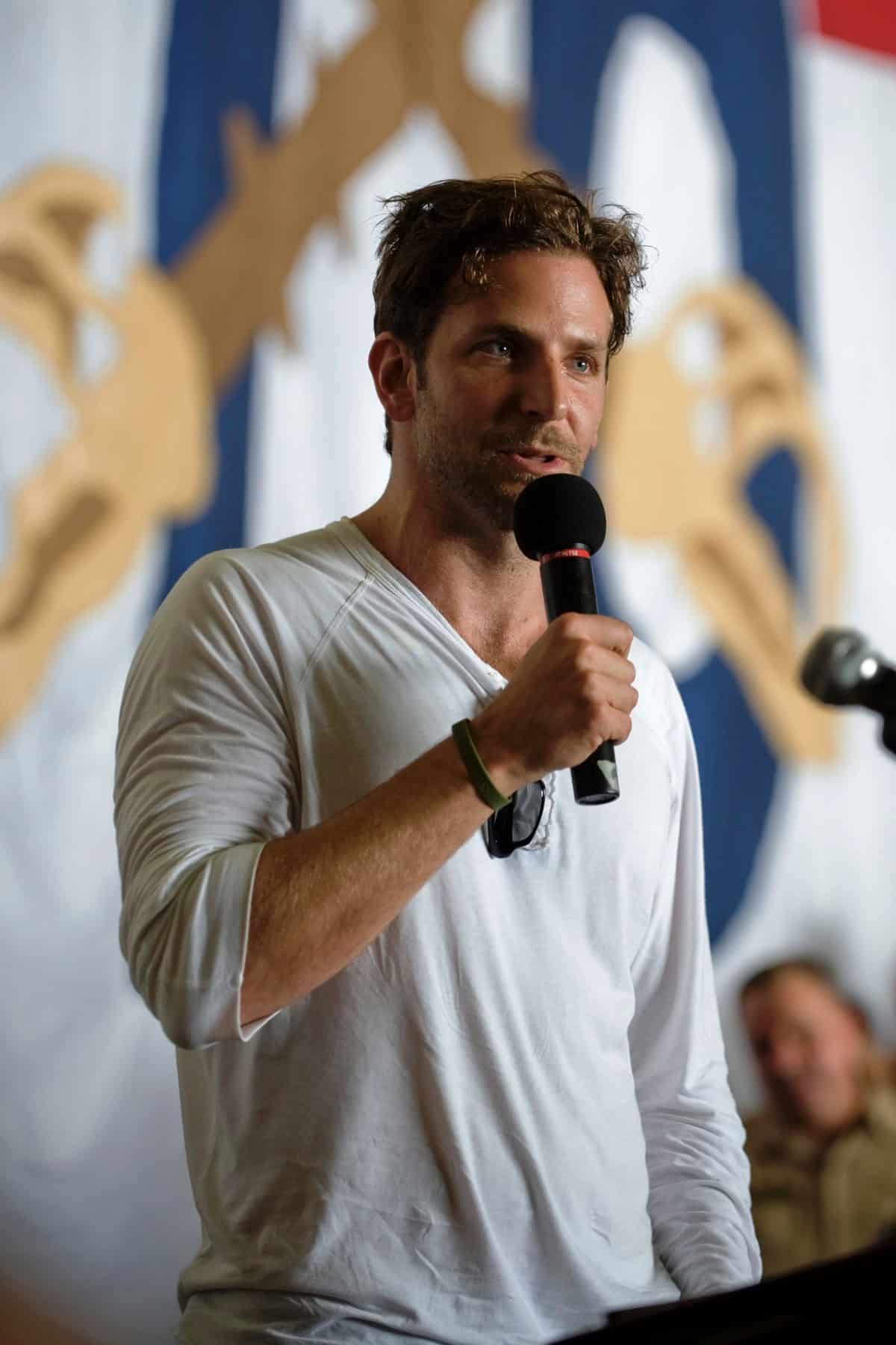 Bradley Cooper addresses the crew aboard aircraft carrier USS Ronald Reagan
